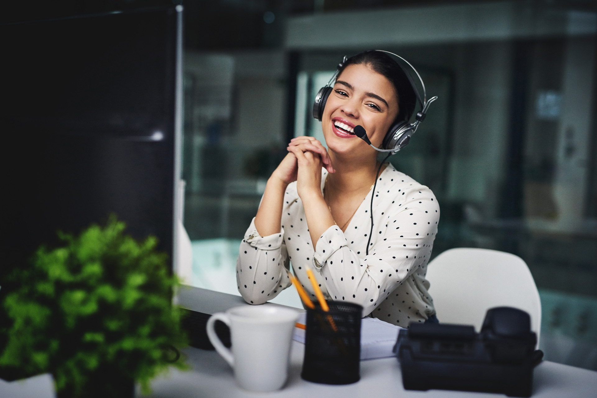 Professional virtual assistant working at a calm, focused workspace
